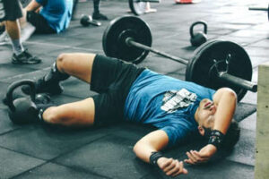 crossfitter laying on the floor